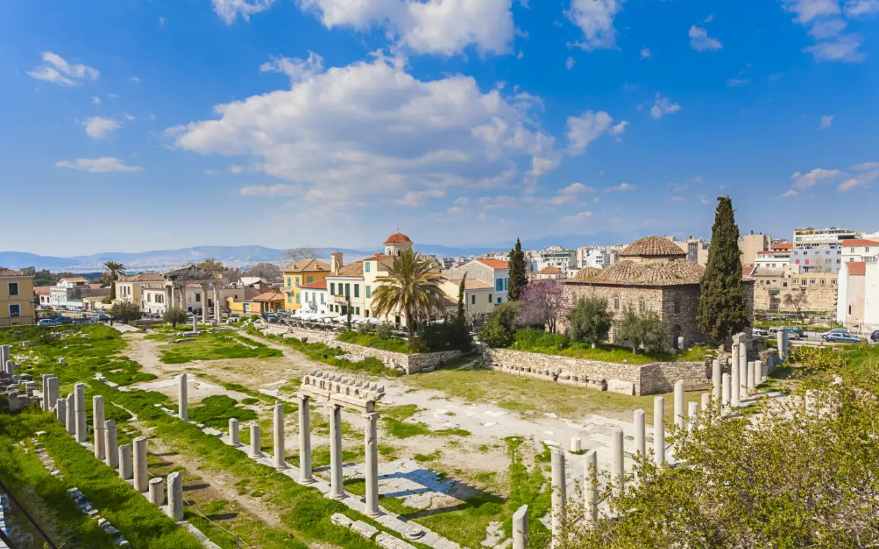 Ancient Agora Of Athens in Greece - a public space in ancient Athens that served as the center of political, commercial, and social activity, featuring ruins of historic buildings such as the Temple of Hephaestus and the Stoa of Attalos.