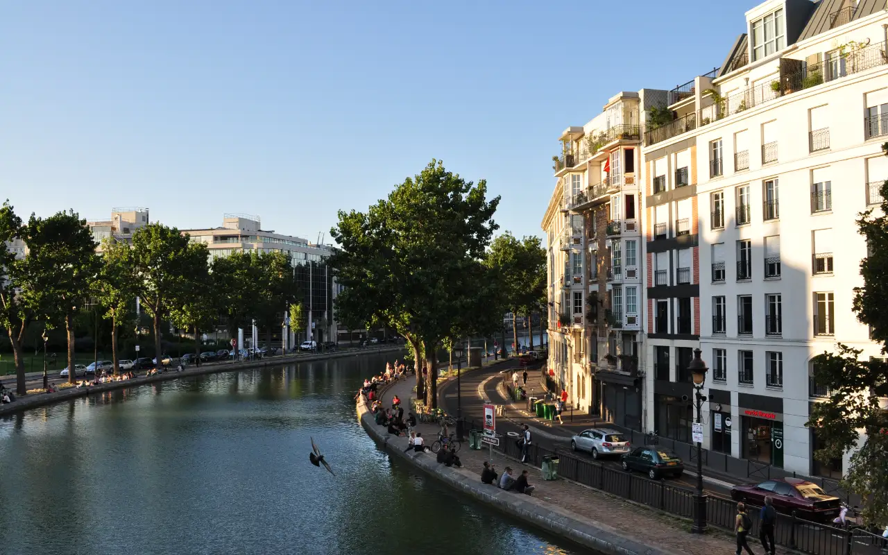 Scenic view of Canal Saint-Martin, a popular Parisian waterfront destination