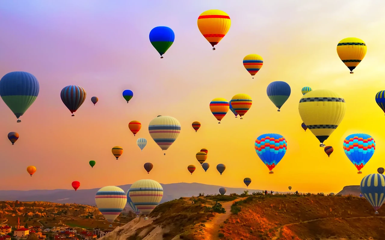 Cappadocia Hot Air Balloon Festival with colorful balloons filling the sky in Cappadocia, Turkey
