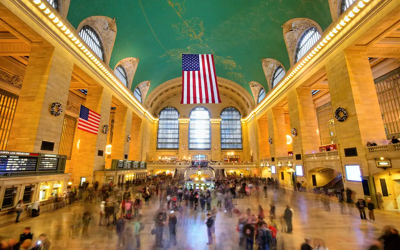 Grand Central Terminal interior with bustling crowds and ornate architecture