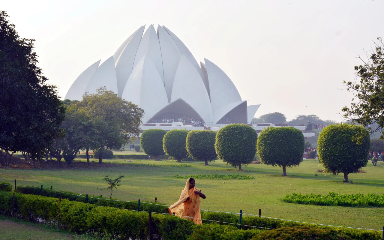 A photo of the stunning Lotus Temple, a Bahá'í House of Worship in New Delhi, India with its unique lotus flower-inspired architecture