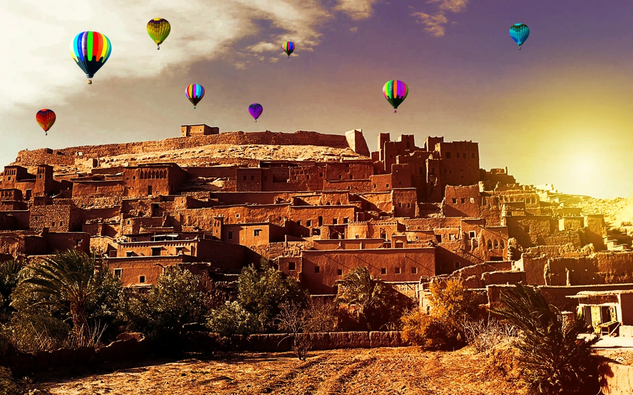 A group of excited balloon riders enjoying a breathtaking view of Marrakesh, Morocco from above