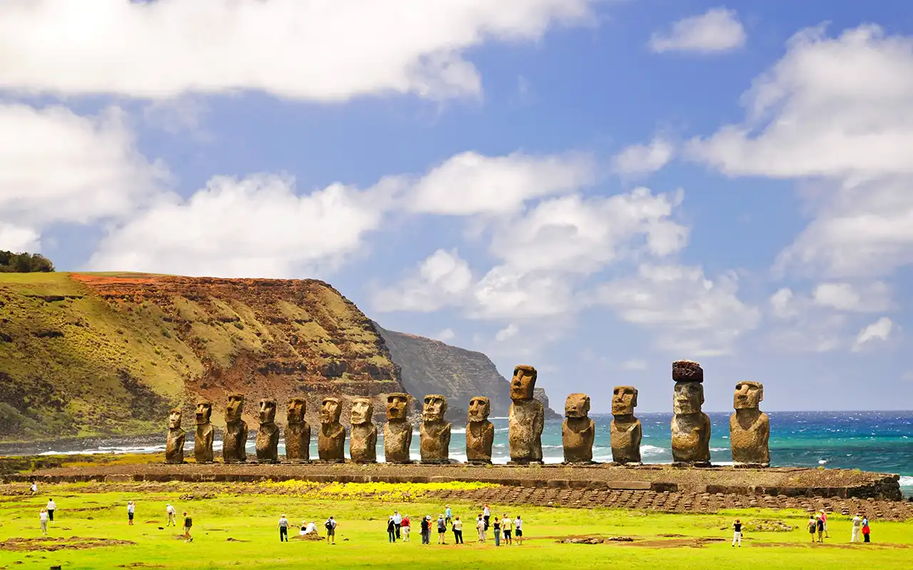 Scenic landscape of Chile with snow-capped mountains and lush greenery