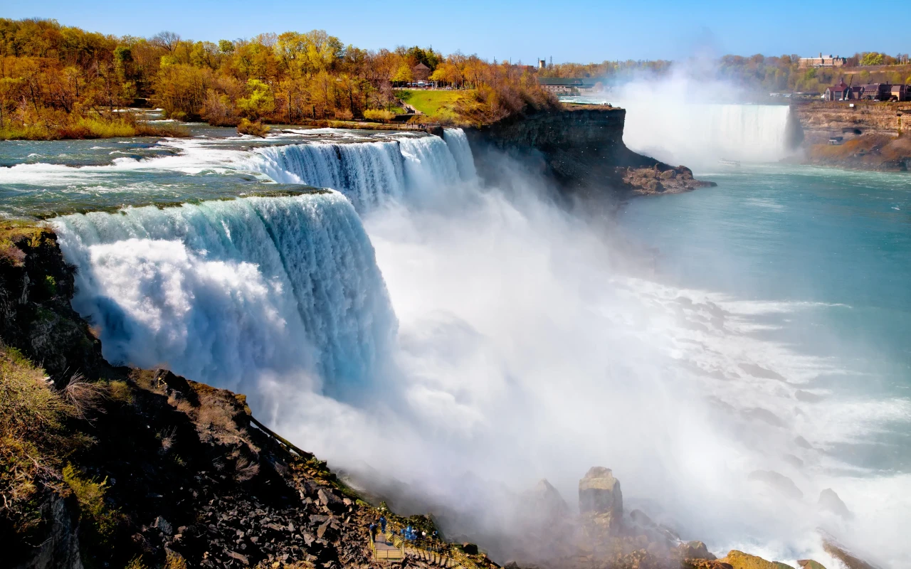 Majestic Niagara Falls with powerful cascading waters and misty atmosphere
