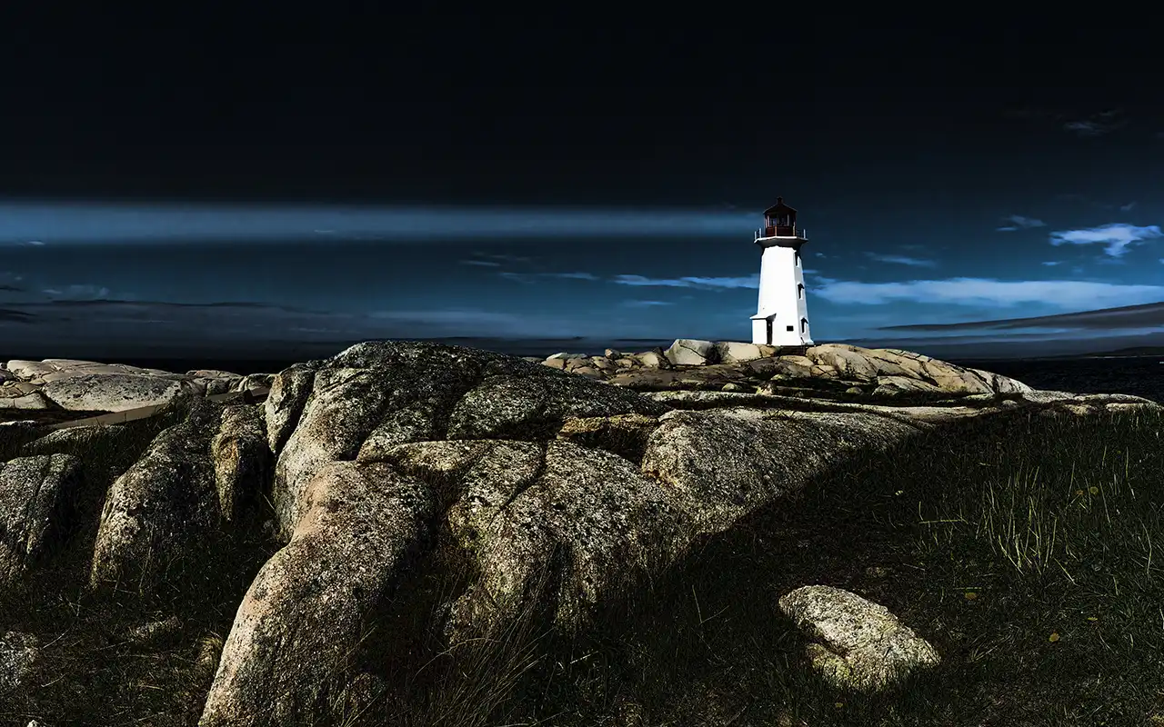 Iconic Peggy's Cove Lighthouse at Sunset