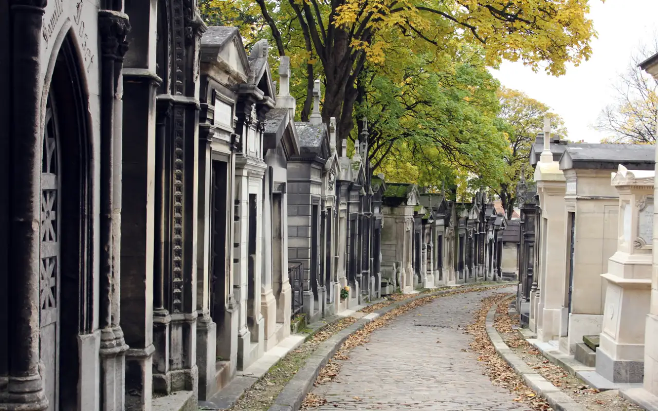 A peaceful path winding through Pere Lachaise Cemetery