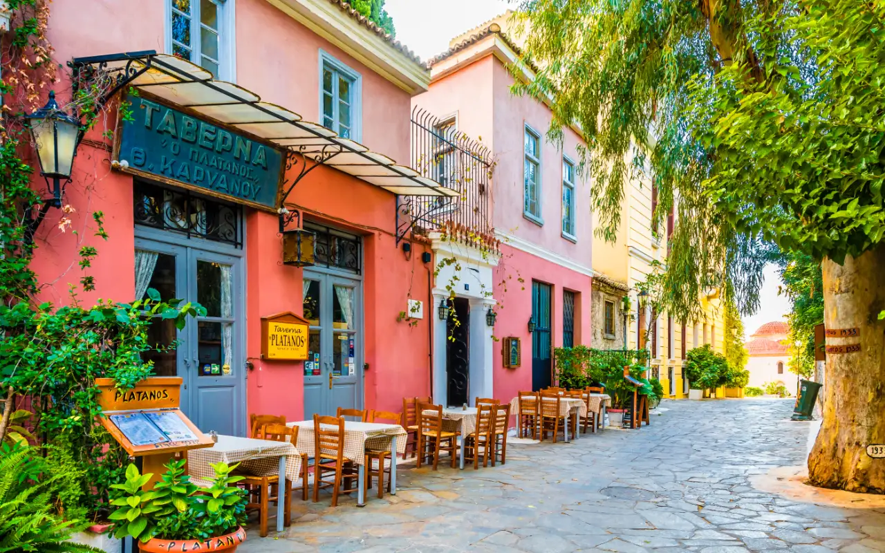 Plaka in Athens, Greece - a historic neighborhood known for its picturesque streets, traditional architecture, and charming cafes, offering a glimpse into the rich culture and history of Athens.