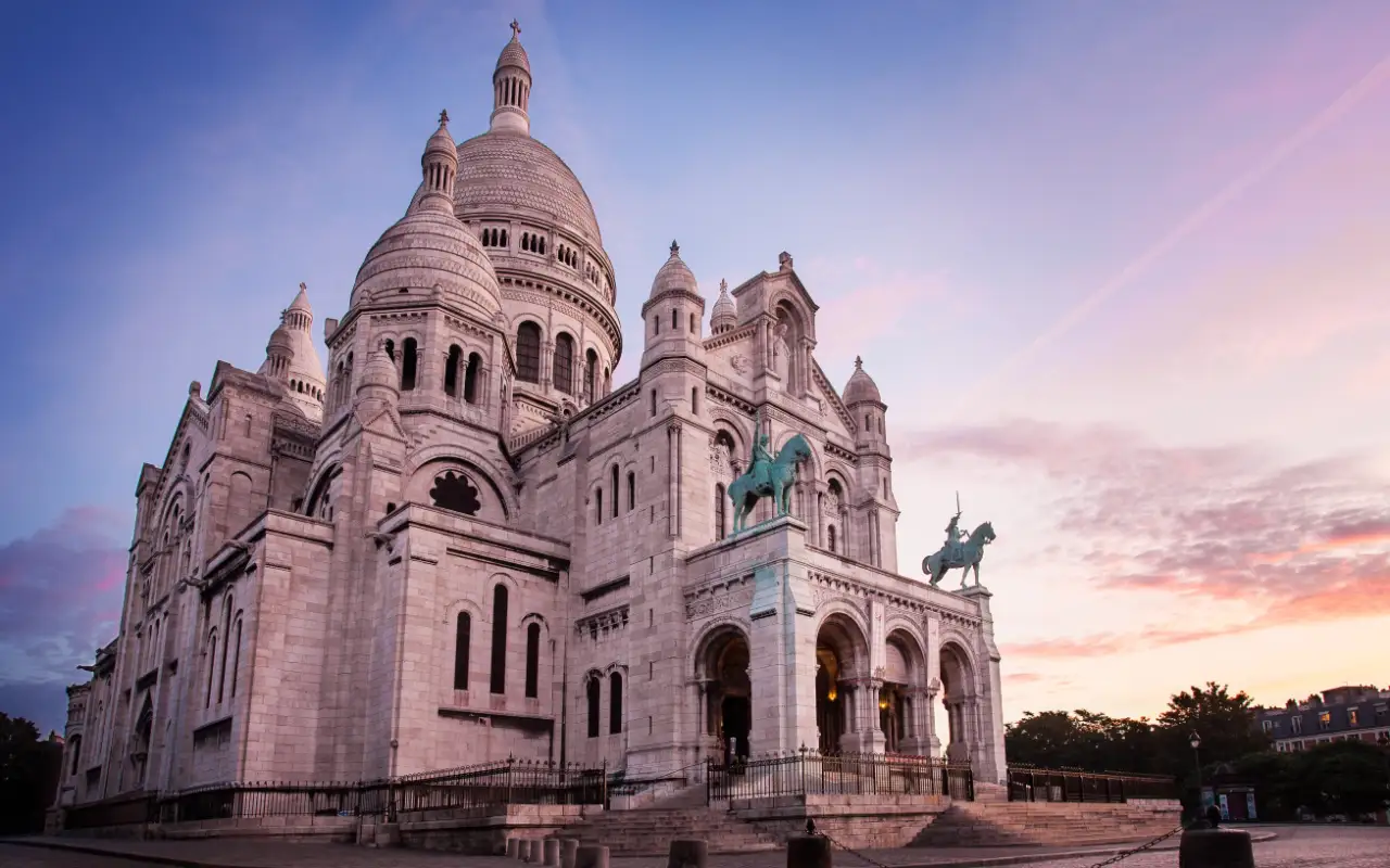 Spectacular view of the white-domed Basilica of the Sacre Coeur on Montmartre hill