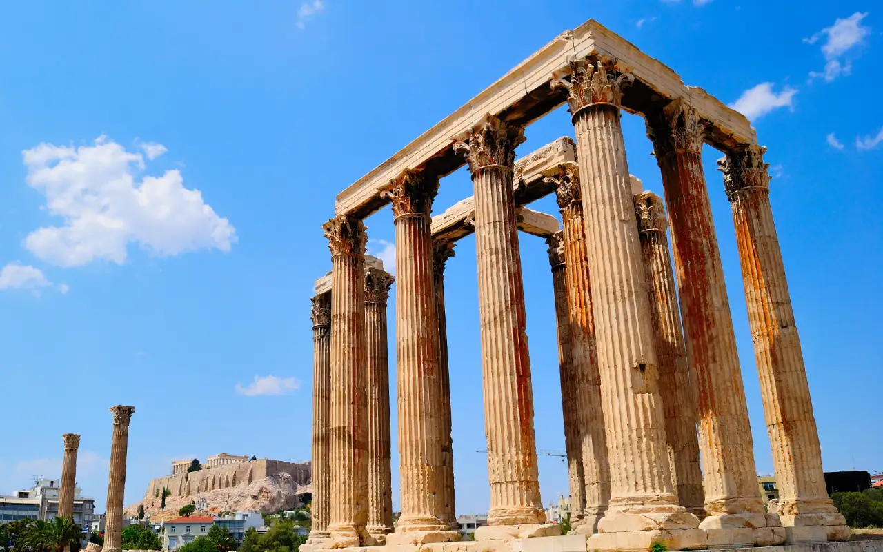 Temple Of Olympian Zeus in Athens, Greece - a massive ancient temple dedicated to Zeus, featuring towering columns and ruins, and a fascinating glimpse into the architectural and cultural legacy of ancient Greece.