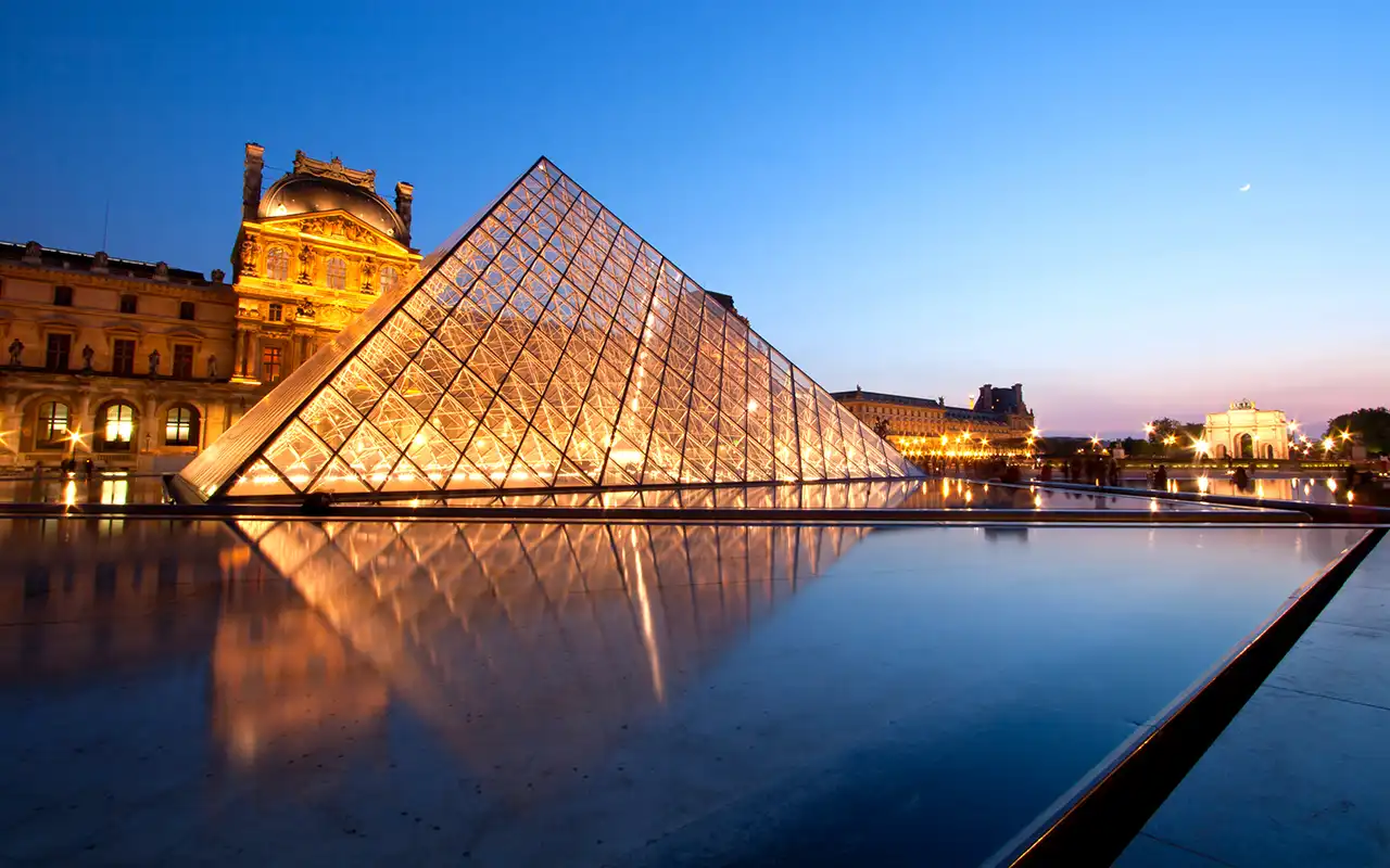 View of the Louvre during sunset.