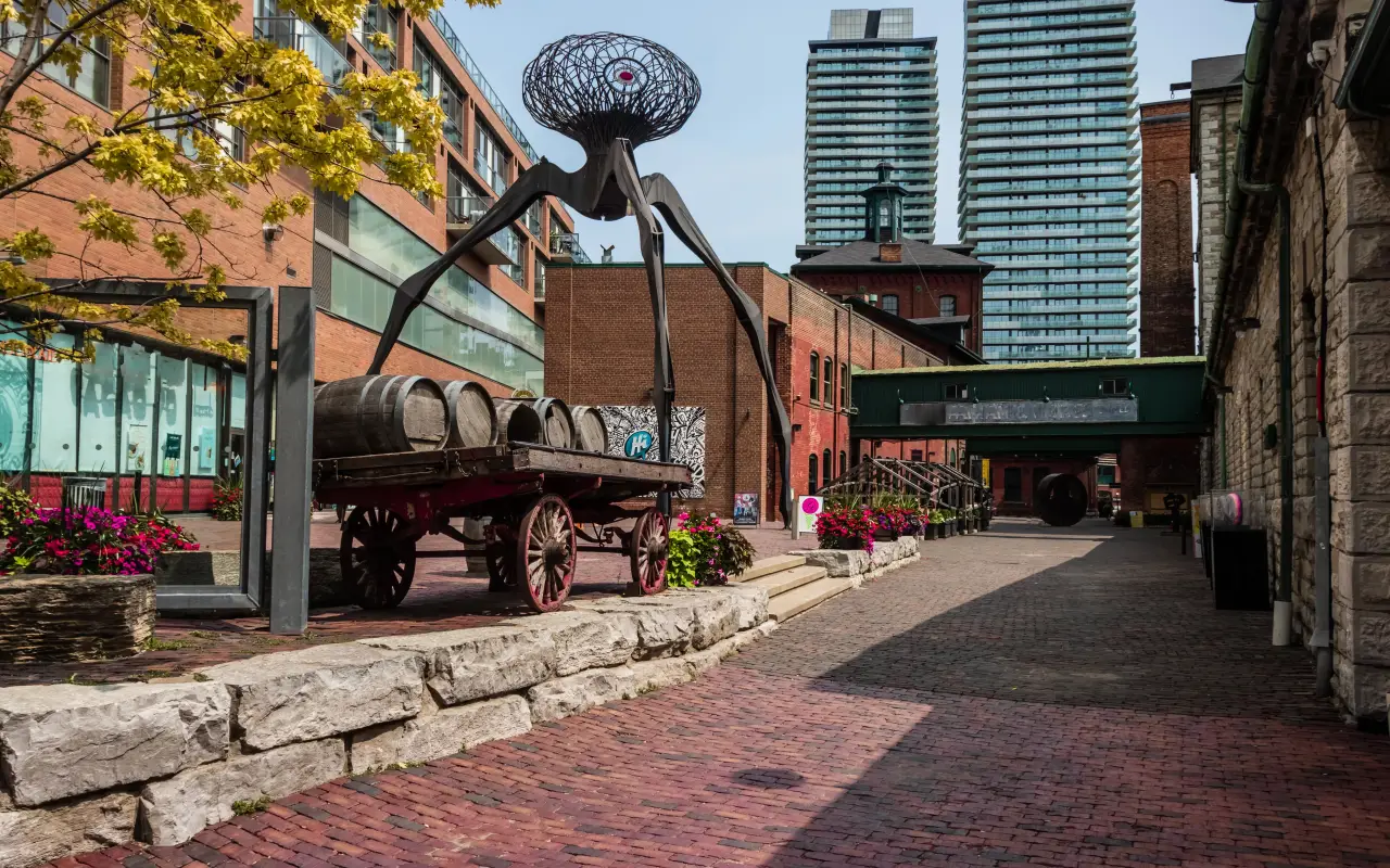 A street view of Toronto featuring urban art and historical architecture