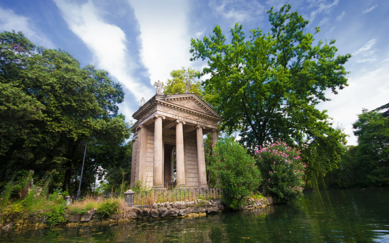 Panoramic view of the lush green Villa Borghese Gardens in Rome