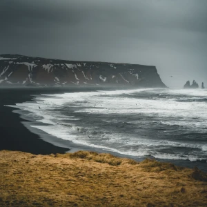 Walk on the Black Sand Beach of Reynisfjara: A Dramatic Icelandic Landscape