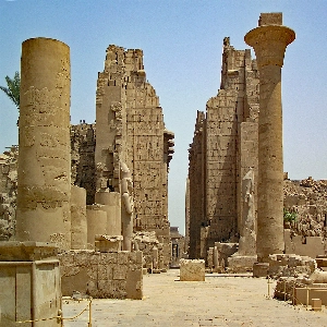 Ancient Egyptian Karnak temple complex with massive columns and hieroglyphics
