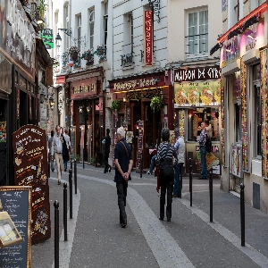A scenic view of the historic Latin Quarter in Paris, showcasing its charming streets and vibrant atmosphere