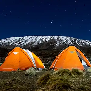 An awe-inspiring view of Mount Kilimanjaro in Tanzania against a clear blue sky