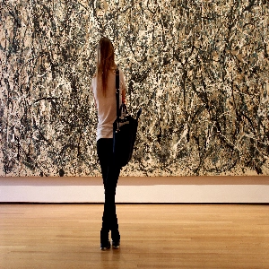 A stunning interior view of the Museum of Modern Art, showcasing a variety of contemporary artworks and installations.