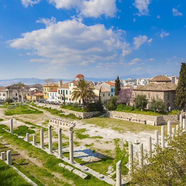 Ancient Agora Of Athens in Greece - a public space in ancient Athens that served as the center of political, commercial, and social activity, featuring ruins of historic buildings such as the Temple of Hephaestus and the Stoa of Attalos.