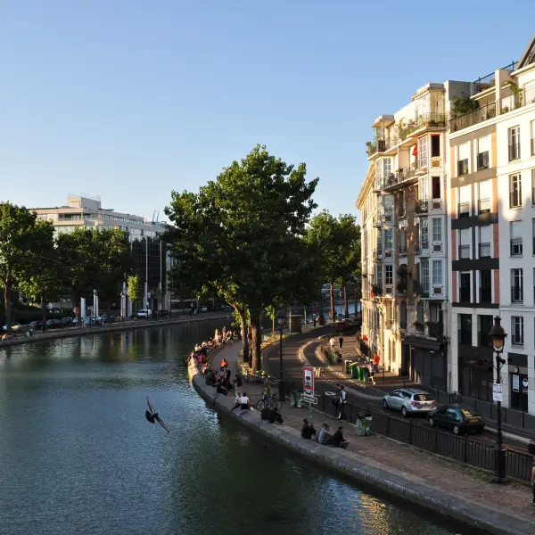Scenic view of Canal Saint-Martin, a popular Parisian waterfront destination