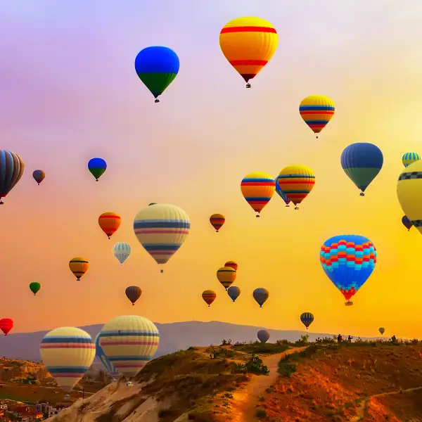 Cappadocia Hot Air Balloon Festival with colorful balloons filling the sky in Cappadocia, Turkey