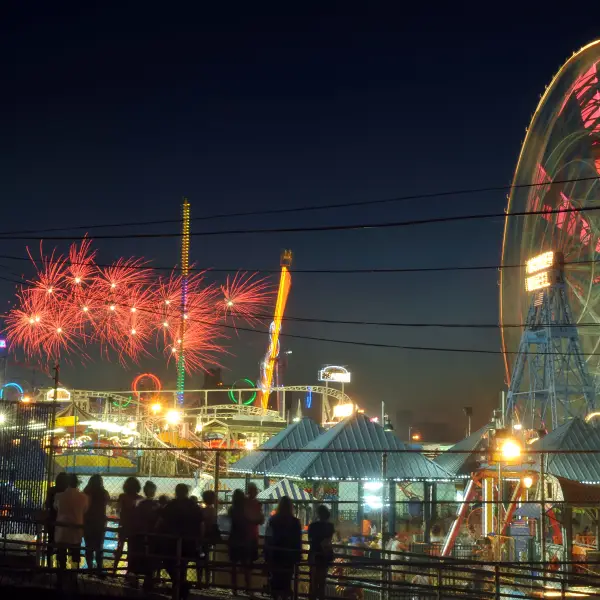 Picture of the vibrant Coney Island with its iconic amusement park attractions and bustling boardwalk.