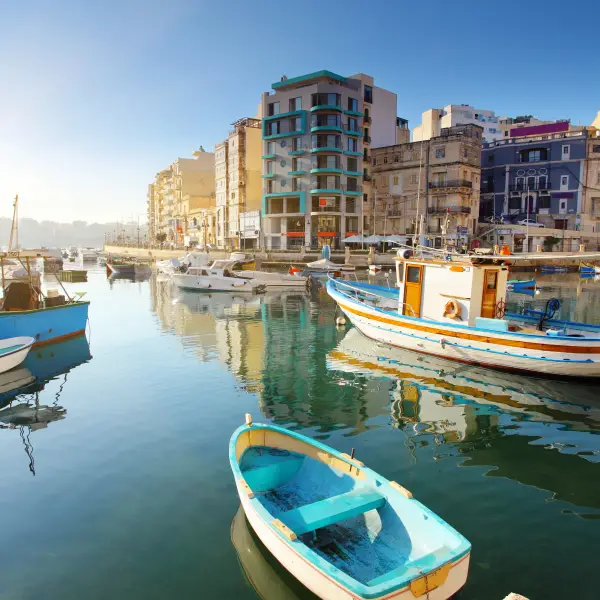 A beautiful view of Malta's stunning coastline and crystal-clear Mediterranean waters, showcasing the island's natural beauty and historical architecture