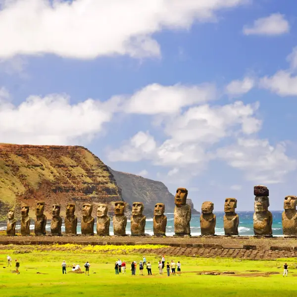 Scenic landscape of Chile with snow-capped mountains and lush greenery