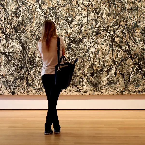 A stunning interior view of the Museum of Modern Art, showcasing a variety of contemporary artworks and installations.