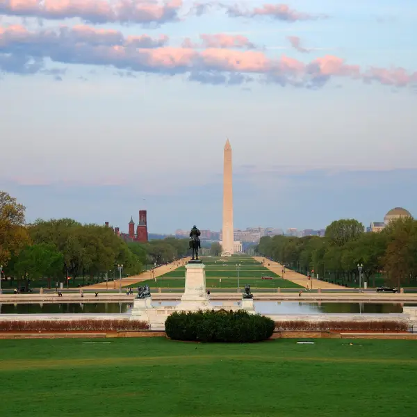 Scenic view of the National Mall with iconic monuments and vibrant greenery