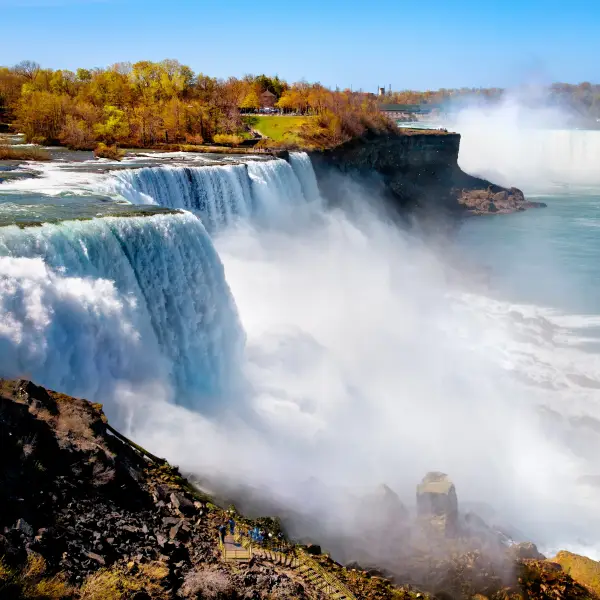 Majestic Niagara Falls with powerful cascading waters and misty atmosphere