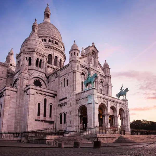 Spectacular view of the white-domed Basilica of the Sacre Coeur on Montmartre hill